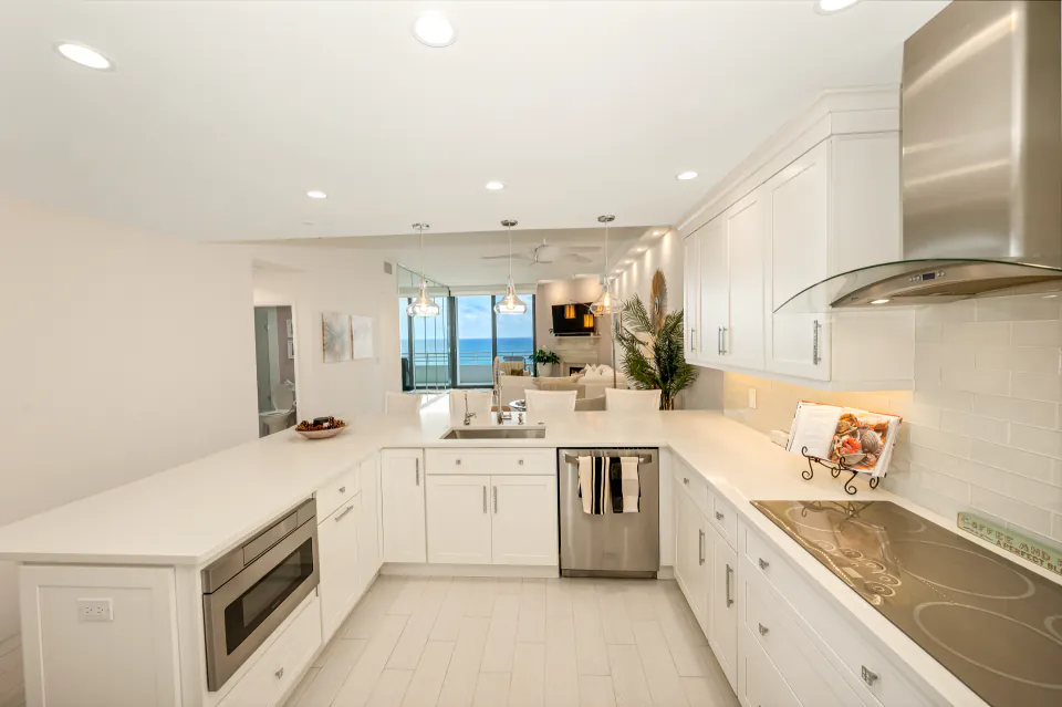 White kitchen with ocean view, Boca Raton real estate photography
