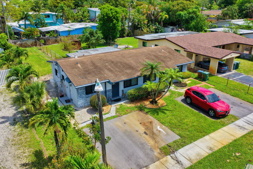 Aerial of single family home and street