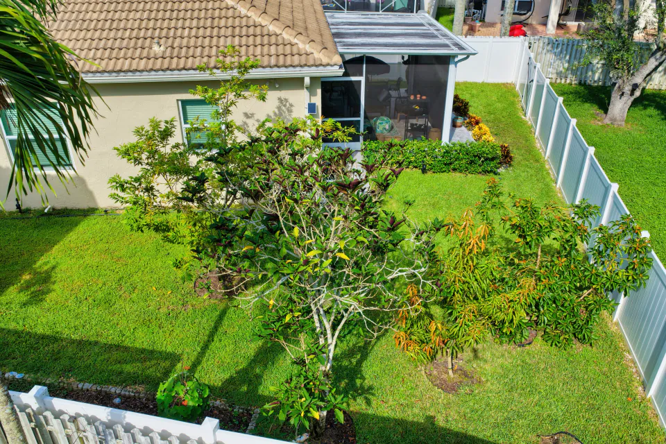 Top-down aerial of property and lot